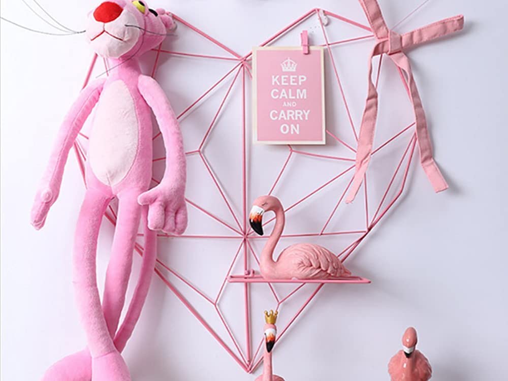 Pink heart frame with photographs