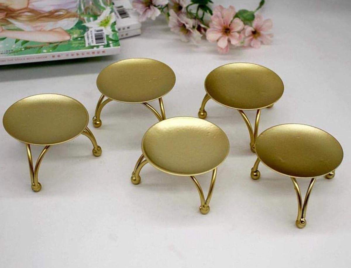 Set of six gold candlestick holders
